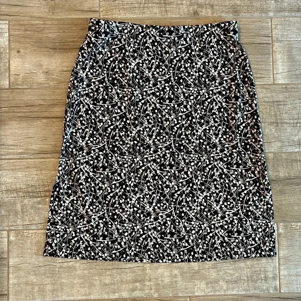 A. Byer midi skirt with small slit on side